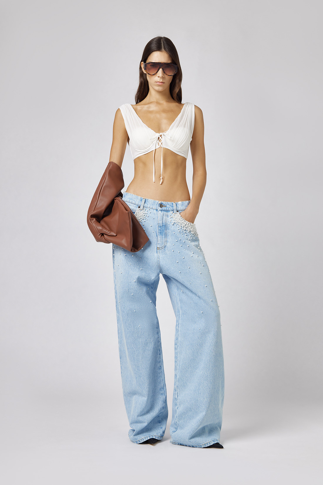 GIUSEPPE DI MORABITO: FIVE POCKET JEANS WITH PEARL DECORATIONS