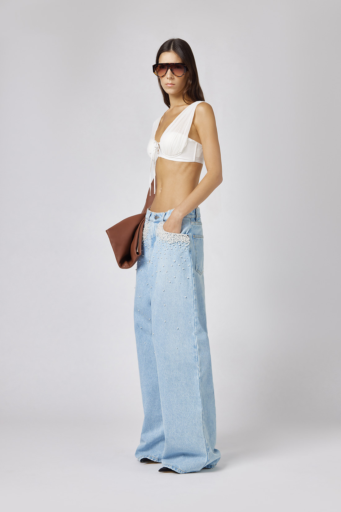 GIUSEPPE DI MORABITO: FIVE POCKET JEANS WITH PEARL DECORATIONS